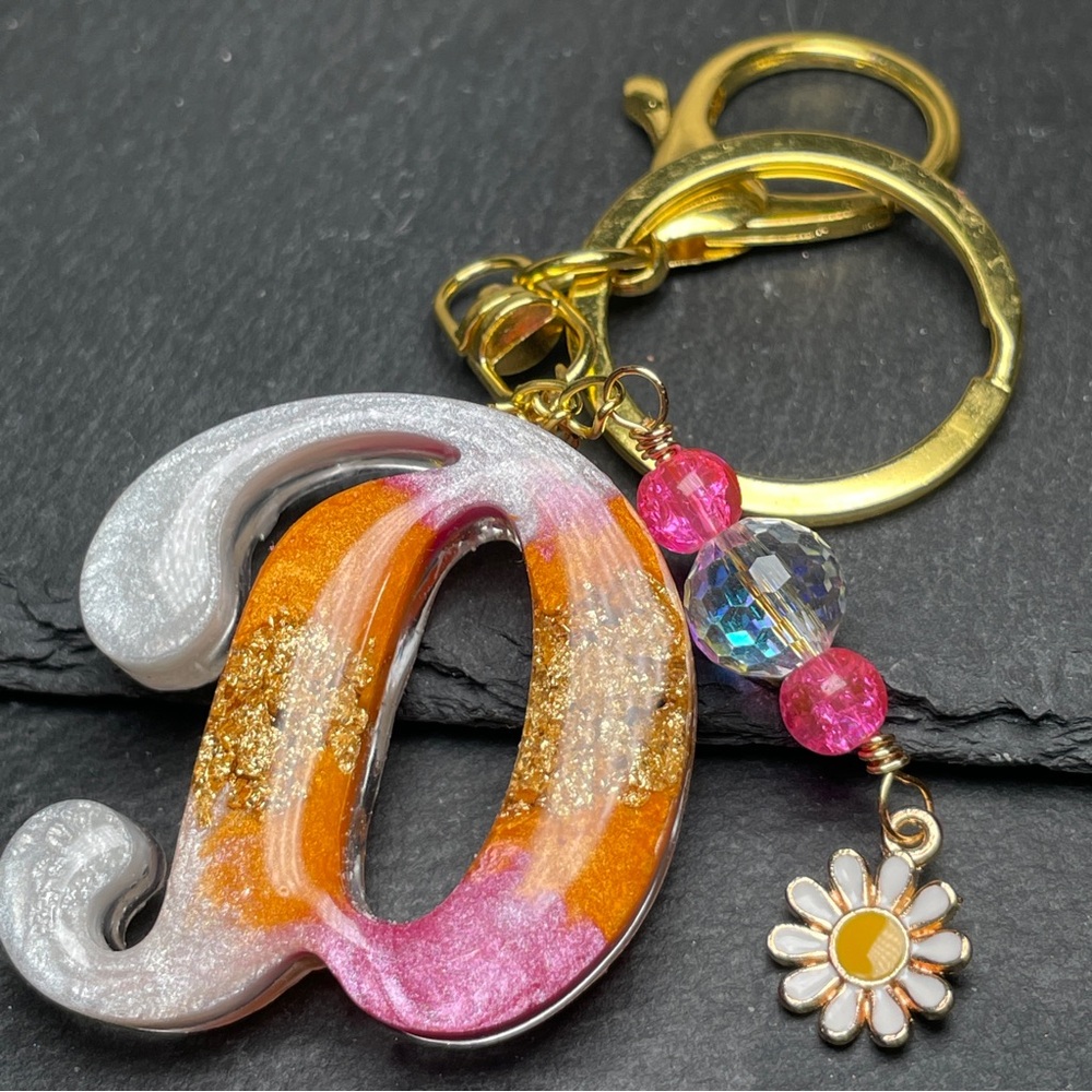 Custom Orange Cream and Pink Letter “D” Keychain with Daisy Charm